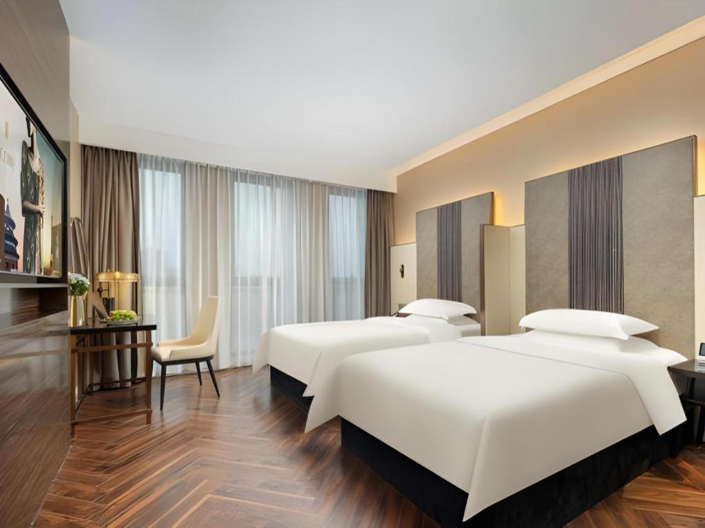 Jinjiang Metropolo Hotel - Taizhou Wanda Plaza Екстер'єр фото