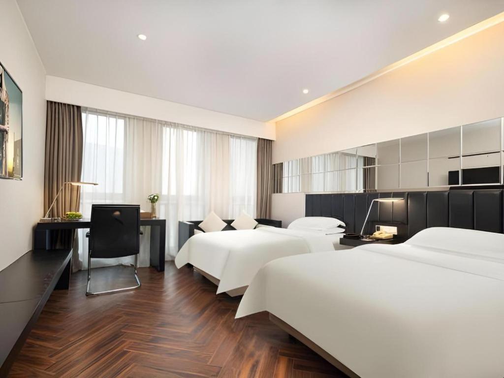 Jinjiang Metropolo Hotel - Taizhou Wanda Plaza Екстер'єр фото